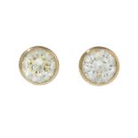 Pair of earrings sleepy in 18 kts. yellow gold. Frontis with diamond, brilliant cut, colour K,