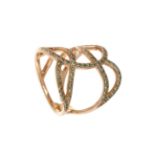 Ring in 18 kt pink gold, with the frontis with intertwined lines curdled with tsavoritas, with a