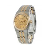 ROLEX Oysterquartz watch for men. Stainless steel and gold case. Gold-plated dial, dotted