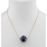 18kt yellow gold pendant with star-shaped lapis lazuli sphere, with adjustable ring for two