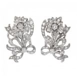 Pair of earrings in platinum and diamonds, 30-40s.Frontis fantasy with bow and floral shapes with