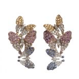 18 kt white gold earrings, with the front formed by three butterflies, all have diamonds, and each