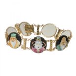 Bracelet in 18kt yellow gold with plaques of oriental characters and gold interlacing. Tongue