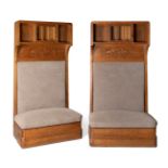 Pair of Art Nouveau armchair sofas, ca. 1900.Carved oak wood. Metal handles and upholstered seats.