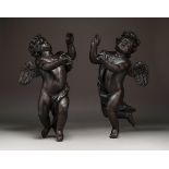 Pair of baroque angels from the 17th century.Carved chestnut wood.Faults, imperfections. Old