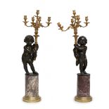Pair of French Napoleon III candlesticks, ca. 1860-70. After "CLODION" (Claude Michele, Nancy,