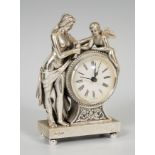 OTTAVIANI table clock in sterling silver. Second half of the twentieth century. Depicting a lady and