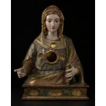 Reliquary bust of Saint Apollonia; Renaissance school, Spain, 16th century.Carved, gilded and