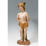 South German school, ca. 1475."Saint Sebastian".Carved, polychromed and gilded wood.Measurements: 83