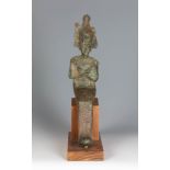 Figure of Osiris; Ancient Egypt, Late Antiquity, 664-323 BC.Bronze sculpture on a wooden base.Sizes: