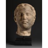 Portrait of a child. Roman culture. 1st - 3rd century AD.Marble.Provenance: Private collection,