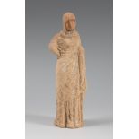 Draped female figure. Hellenistic period, Tarentum, Magna Graecia (4th-3rd BC).Terracotta.