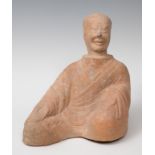Sculpture of a courtier; Han Dynasty, China, AD 25-220.Terracotta.Size: 34 x 25 x 16 cm.Sculpture