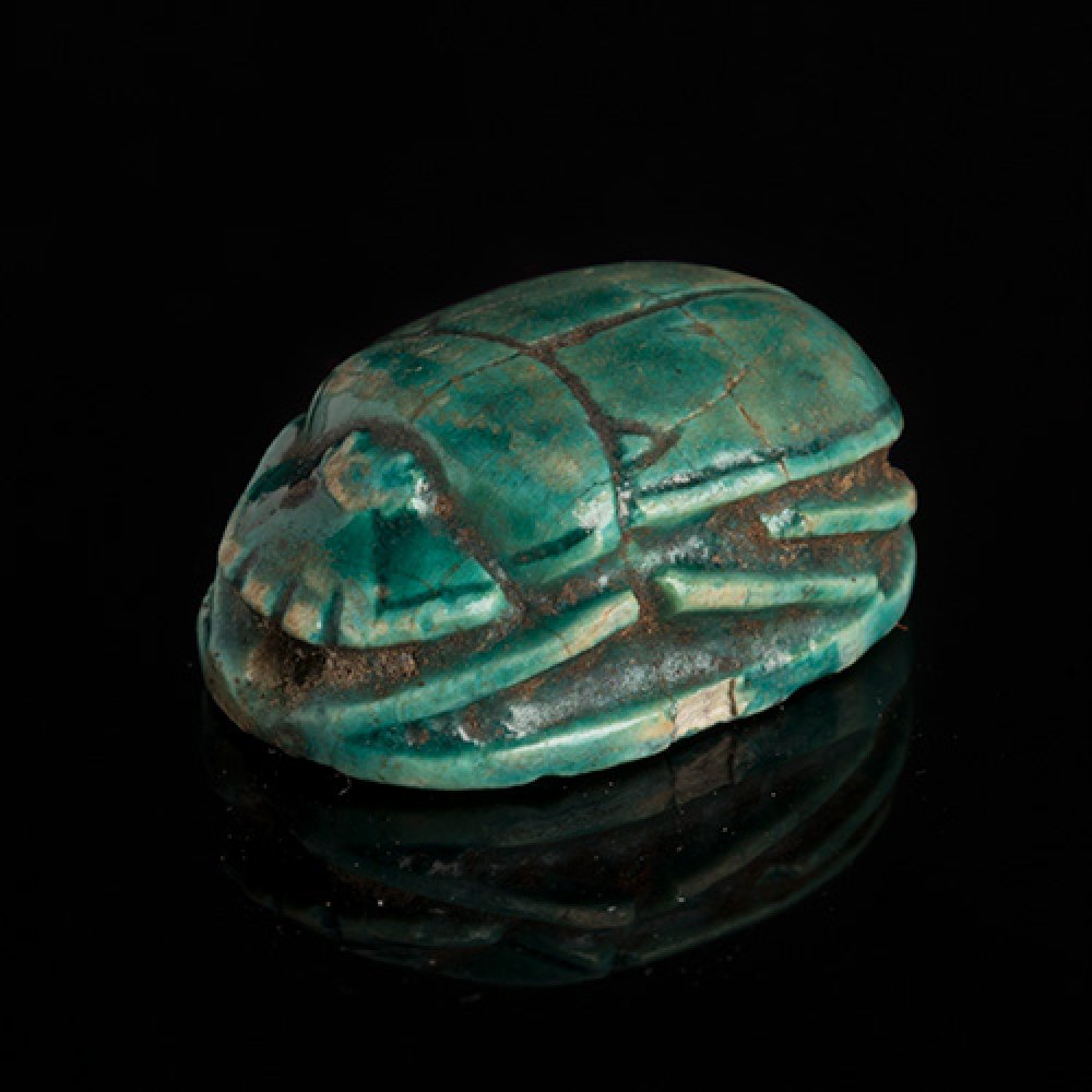 Scarab in the name of Thutmose III. Ancient Egypt, New Kingdom, 1479-1458 BC.Glazed steatite.