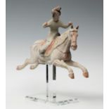 Polo player; China, Tang Dynasty, AD 618-907.Polychrome terracotta.Thermoluminescence certificate