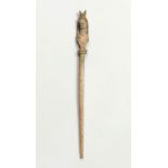 Hair needle; Rome, 2nd-3rd century AD.Bone.With material adhesions.Measurements: 11 x 0.5 cm.