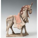 Decorated horse; China, Wei Dynasty, AD 386-535.Polychrome terracotta.The central area of the