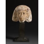 Upper part of a sculpture of a nobleman. Ancient Egypt. 26th Dynasty, 664-525 BC.Limestone and