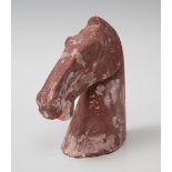 Horse head; China, Han Dynasty, AD 206-220.Polychrome terracotta.It shows signs of damage caused
