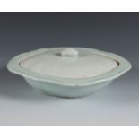 Celadon fountain with lid. China, 19th century.Celadon porcelain.Slightly chipped on the rim.