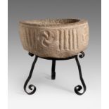 Romanesque baptismal font, 11th-12th century.Stone.Measurements: 22 x 50 x 50 cm.Baptismal font in