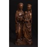 Flemish school, Mechelen Gothic model; 16th century."Virgin and Child with Saint Anne.Carved wood.It