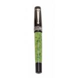 DELTA FOUNTAIN PEN "LVGDVNVM".Barrel in green marbled and black resin.Limited edition, 145/998.