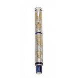 MONTEGRAPPA "GEA" FOUNTAIN PEN.Barrel in resin, engraved silver and yellow gold.Limited edition