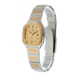 BAUME MERCIER ladies' watch in steel and yellow gold. Gold-plated dial with dotted numerals. Baton-