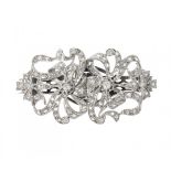 Double clip brooch in platinum and diamonds. Model with loop-shaped frontispiece dotted with