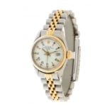 ROLEX Date watch, ref. 6517, n.388523, for ladies, year 1975.In yellow gold and steel. Plexiglass