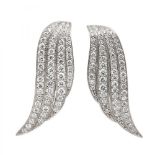 Pair of earrings made in 18 kt white gold, in the shape of wings set with 120 diamonds, brilliant