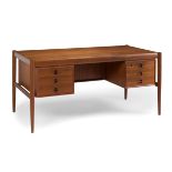 Writing table. Denmark, 1960s-70s.Teak wood.Use marks.Measurements: 72 x 154 x 81 cm.Desk with an