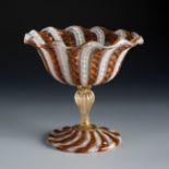 Salviati & Co. Murano, Venice, late 19th century.Cup. Blown glass and fine gold inclusions.Similar