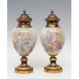 Pair of Sèvres goblets; France, second half of the 19th century.Enamelled porcelain.The lids are