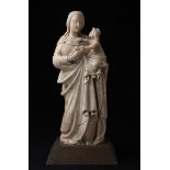 School of Trapani; Sicily, 17th century."Madonna and Child.Carved alabaster.Measurements: 64 x 29
