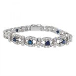 Bracelet in 18kts white gold with six natural sapphires, carré cut, originally from Siam, total