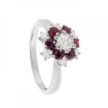 18kt white gold floral rosette ring with a central brilliant-cut diamond weighing ca. 0.50 cts,