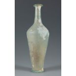 Long-necked bottle. Rome, 3rd-4th century AD.Iridescent translucent blown glass.In very good state