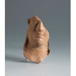 Head with deity. Smyrna, 4th-3rd century BC.Terracotta.Provenance: Smyrna, 1895-1905. Collection
