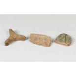 Lot comprising three fragments; Almohad period, from the 8th-10th centuries.Ceramics with