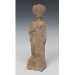 Female statue; Greece, Boeotia, 5th century BC.Terracotta.The fracture line at the neck has been