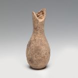 Roman ointment. 1st-3rd century AD.Terracotta.Measurements: 7 x 3 cm .Terracotta vessel with a
