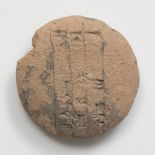 Lenticular tablet; Middle Babylonian period; 14th-13th century BC.Terracotta.It shows losses and