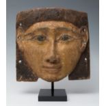 Egyptian mask from the Late Antique period (664-332 BC).Polychrome sycamore wood.Provenance: Private