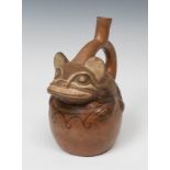 Huaco; Moche Culture, Peru, AD 400-700.Ceramic.Measurements: 29 x 10 x 15 cm.Vessel with a