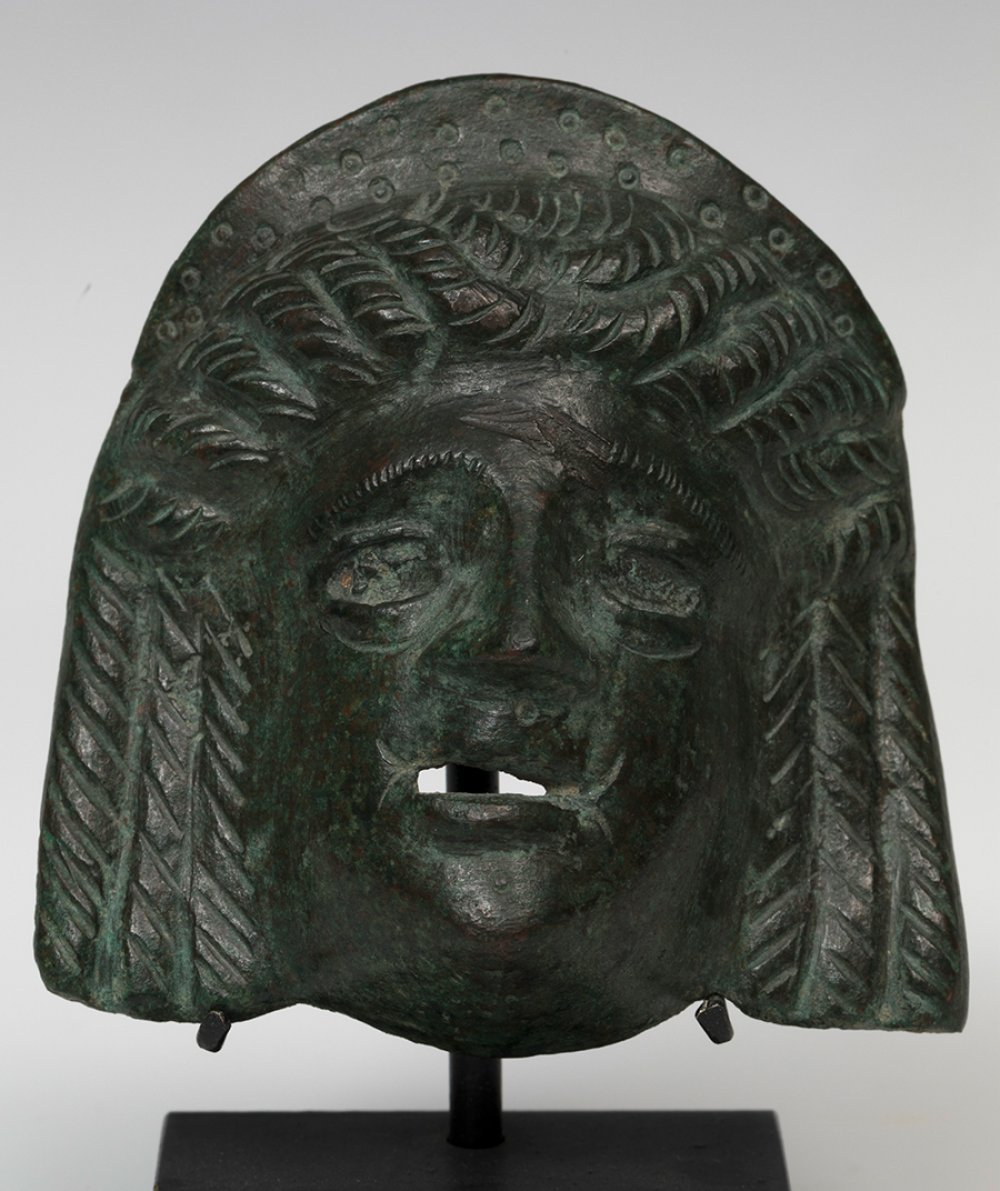 Theatre-mask applique; Rome, 2nd century AD.Bronze.Slightly missing from the forehead.Provenance: - Image 2 of 5
