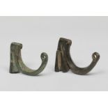 Pair of tower fibulae; Celtiberian culture; 3rd-2nd century BC.Bronze.Both show loss of the spire.