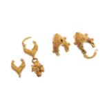 Two pairs of earrings. Rome, 2nd-3rd c. AD.In gold.Measurements: 23 x 16 and 18 x 17 mm; 35 x 13 and