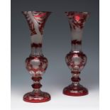 Pair of Bohemian vases, 19th century.Bent and cut glass.Slightly chipped at the mouth.